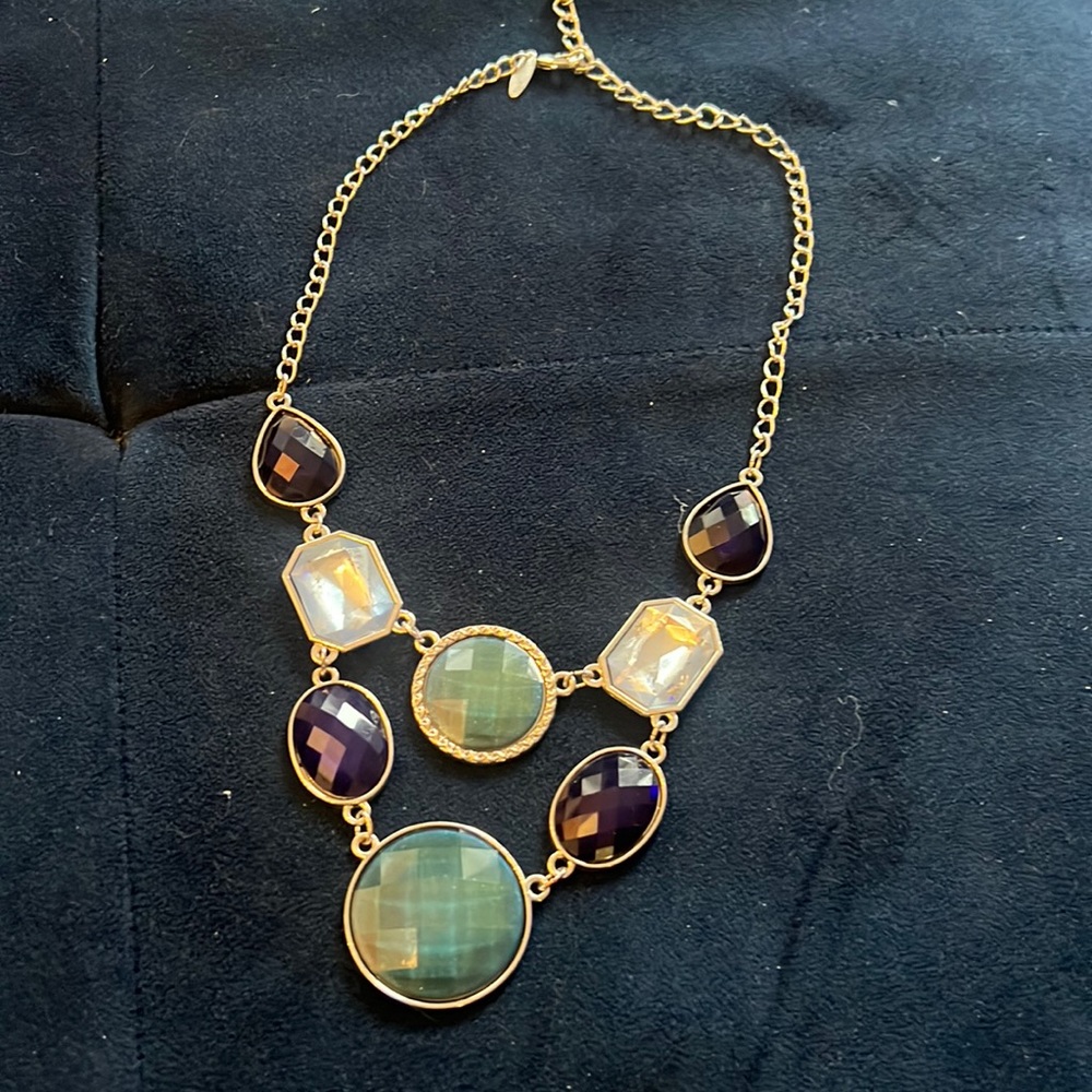 Statement necklace. Silver with cool gem tones. Blue, teal and clear